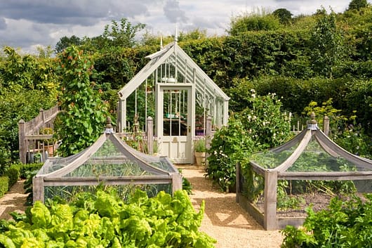 The Hidcote greenhouse from the National Trust greenhouse collection by Alitex. This greenhouse is powder coated in Wood Sage.